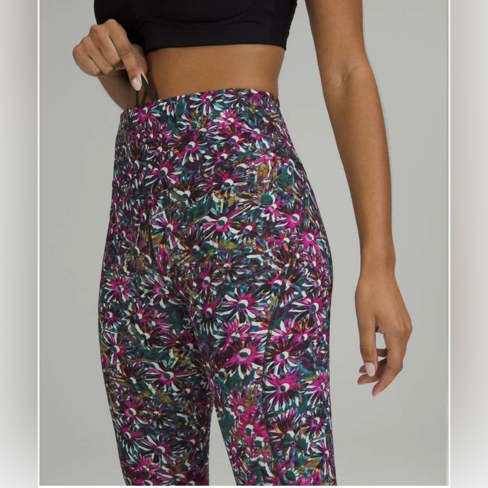 Lululemon Base Pace High-Rise Tight 25" in the "Floral Electric Multi" print.